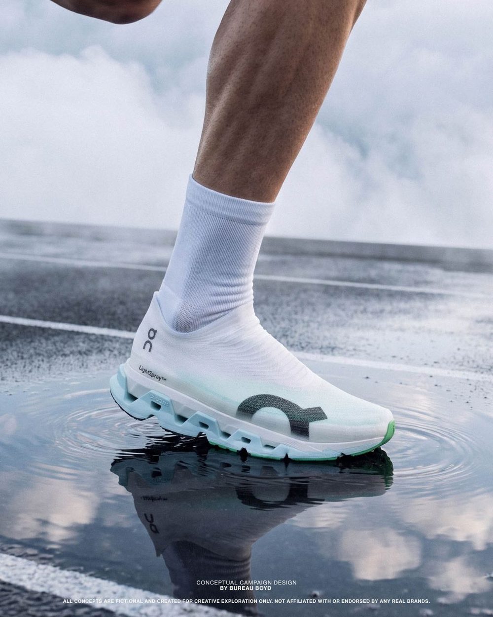 Shoe touching a puddle on wet tarmac