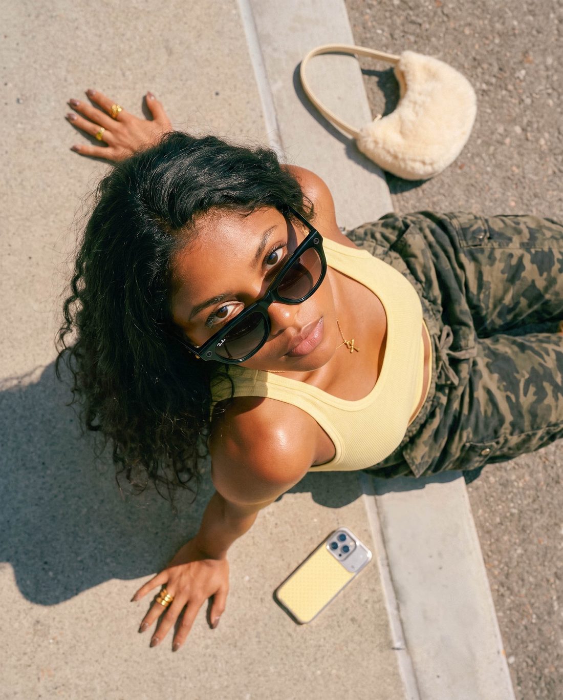 Model on the sidewalk, shot from above at an angle